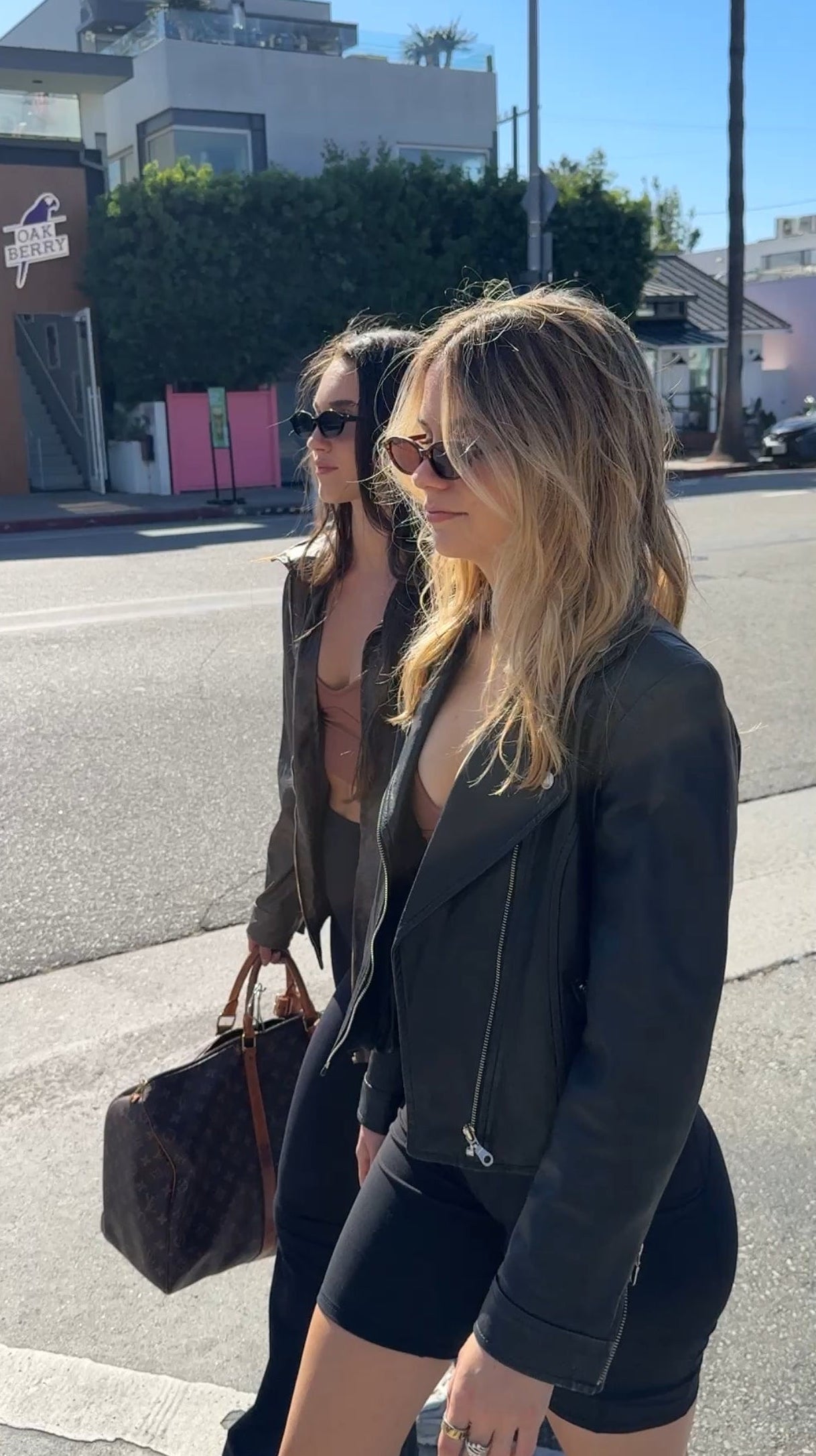 Moto biker shorts cover photo parked with maybe crop top bralette